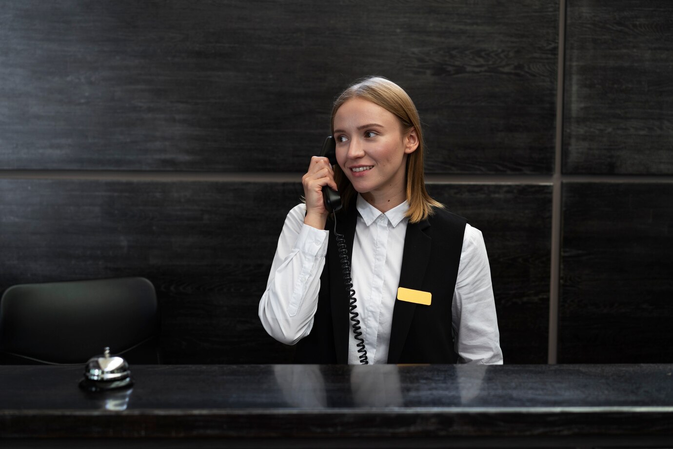Front desk on phone
